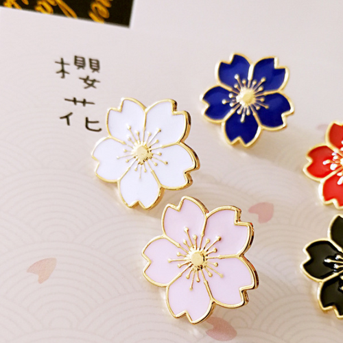 white sakura pin fashion accessory